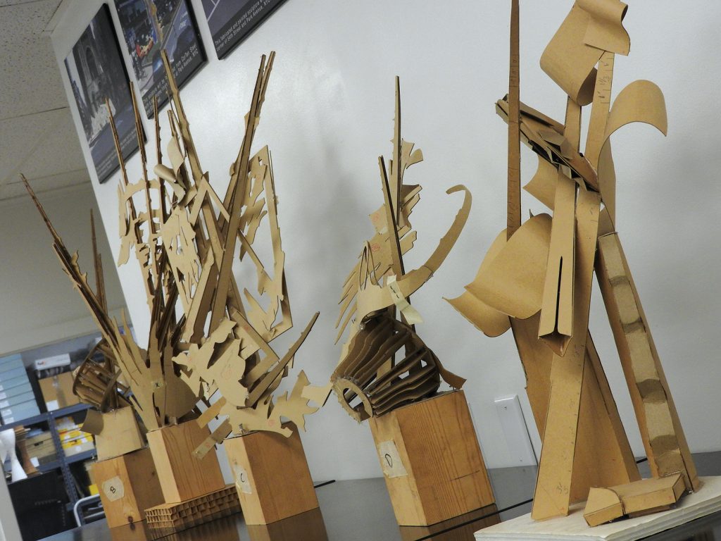 Cardboard models of sculptures.