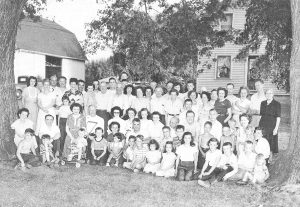 A Wittman family reunion circa 1949. Mary, then about five years old, is in the front row.  