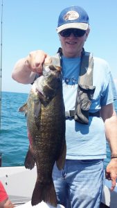 Greg Jones of Victor with a nice Lake Erie smallmouth. Greg is a hardcore bass fisherman who fished over 100 days last year, landing more than 1,000 bass. Provided photo 