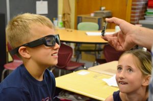  Third-graders in Erin Ayer’s class at T. J. Connor Elementary try out the Vuzix Blade AR Smart Glasses during the Career Day.