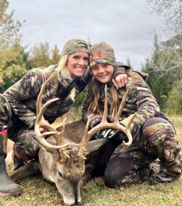 Though their numbers are decreasing, there are still some young people enjoying the sport of hunting.  Mother Megan and daughter Shaye Angelo with a beautiful whitetail buck. Provided photo 