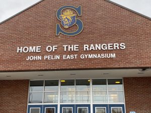 The outside entrance now bears the name John Pelin East Gymnasium. Provided photo 