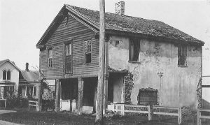 First house and store erected in 1809 by Austin Atchinson on the northeast corner. It was torn down in the 1930s.