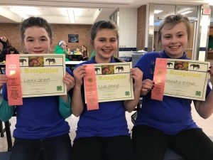 Genesee County 4-H Junior Horse Bowl and Hippology team members (l-r) Laura Grant, Leah Amend, and Alexandra Witmer. 