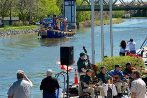 The Golden Eagle String Band performing canalside.